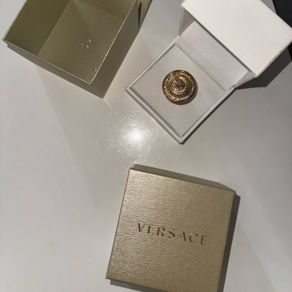 Authentic Versace vanitas ring size 7 used. Comes with box